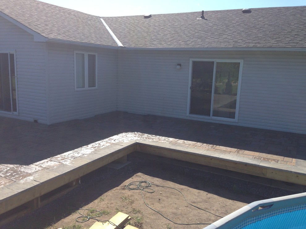 Huge transitional backyard deck photo