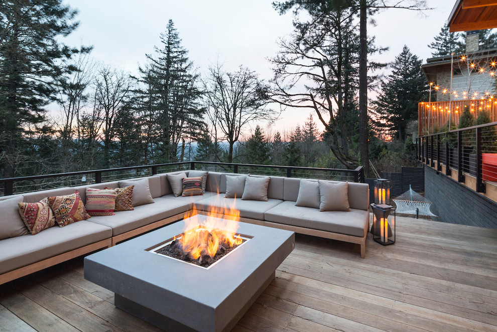 Deck - mid-century modern backyard deck idea in Portland with a fire pit and no cover