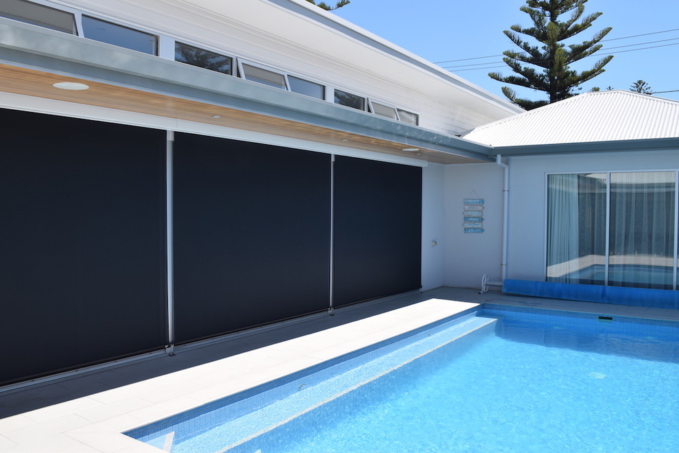 Inspiration for a modern pool in Adelaide with tile.