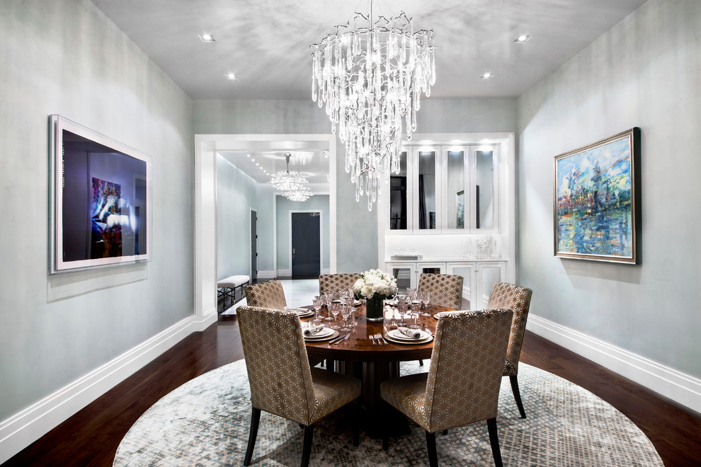 Design ideas for an expansive transitional separate dining room in New York with grey walls, dark hardwood floors and no fireplace.