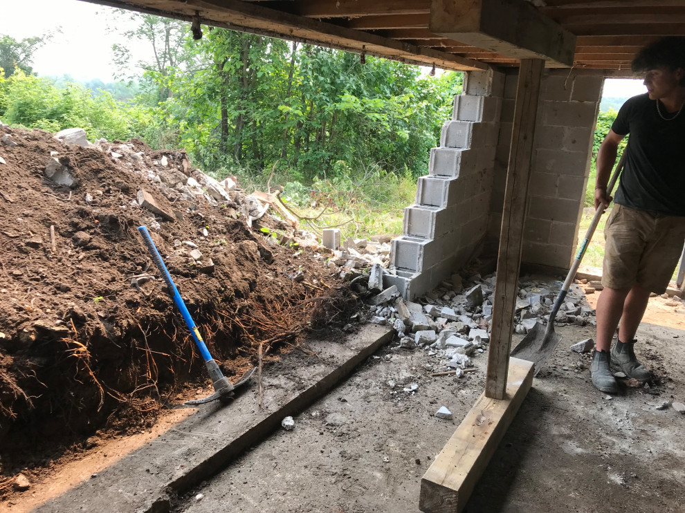 Failing foundation wall replacement and waterproofing