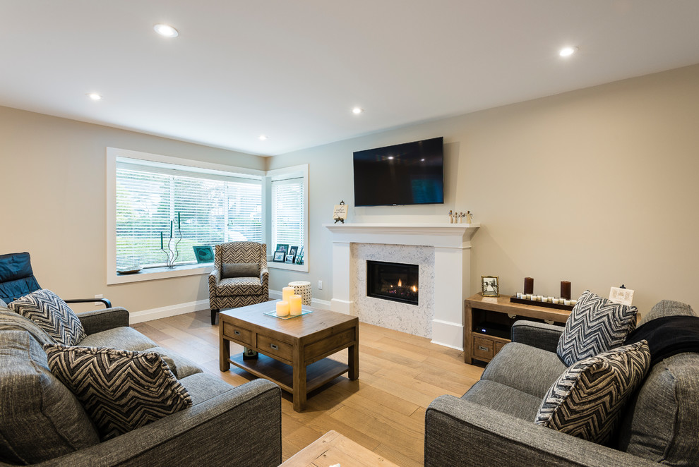 Example of a transitional home design design in Vancouver