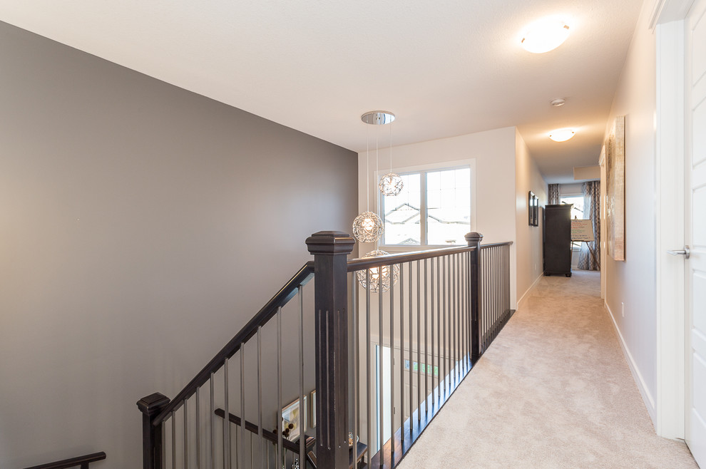 Transitional home design photo in Edmonton