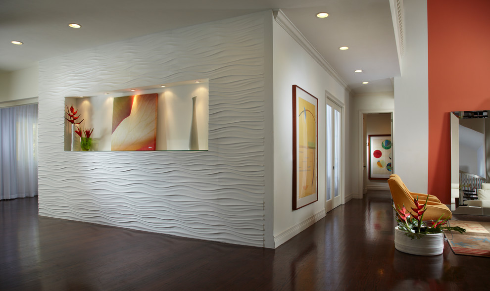 Design ideas for a mid-sized contemporary home design in Miami.