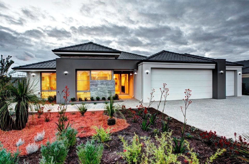 Inspiration for a large contemporary one-storey brick beige exterior in Perth with a hip roof.