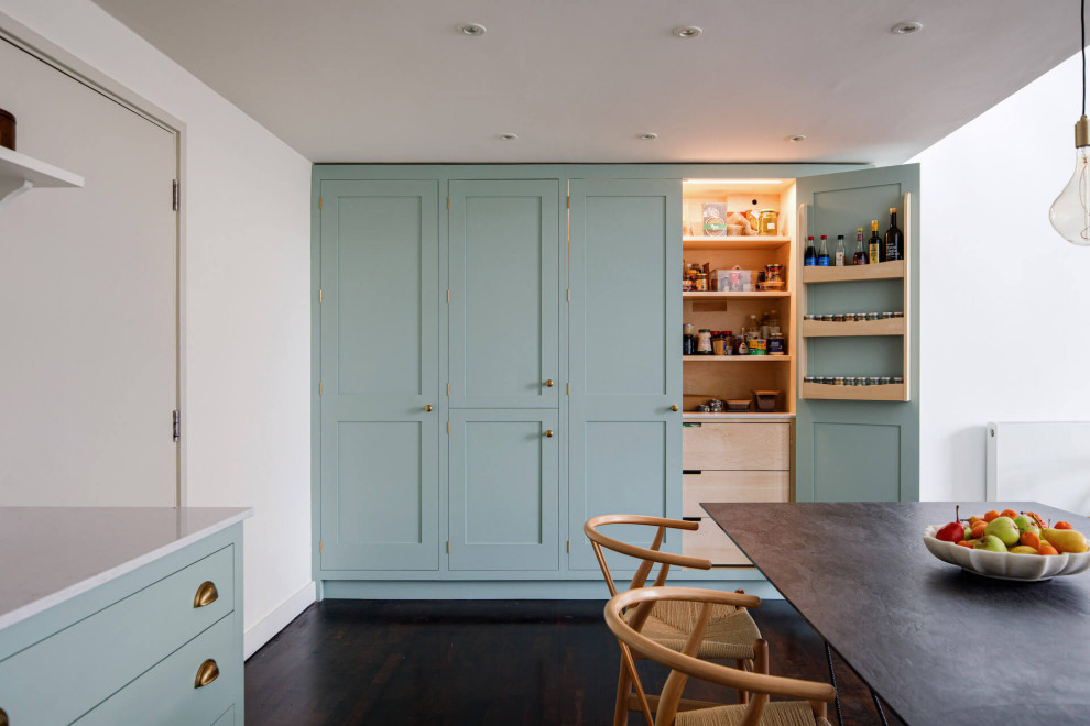 Mid-sized urban open concept kitchen photo in London with a farmhouse sink and shaker cabinets