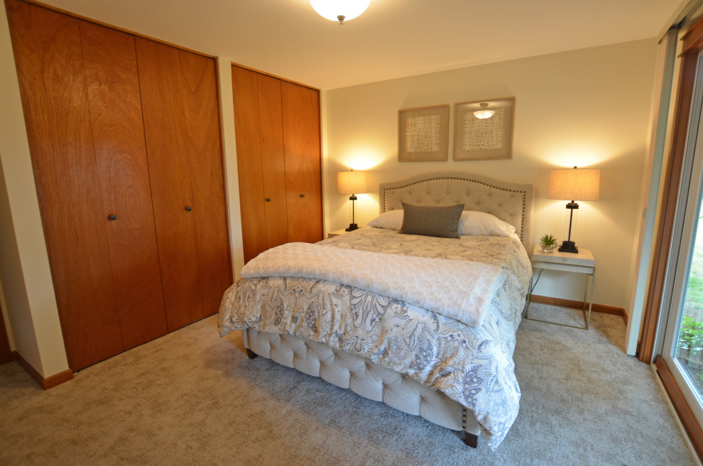 Small contemporary master bedroom in Portland with grey walls, carpet and grey floor.