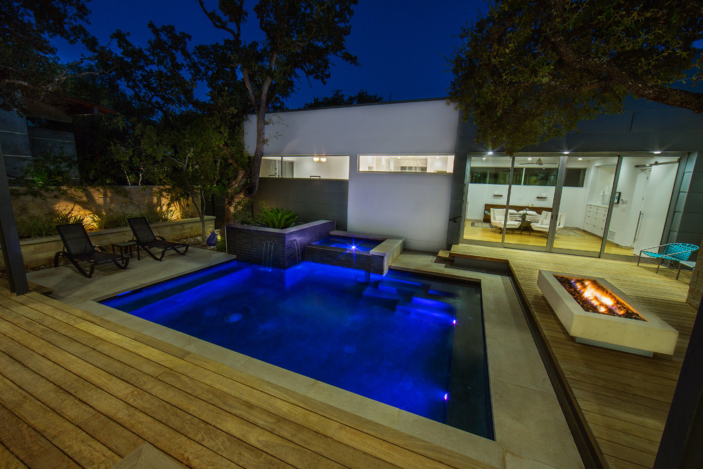 This is an example of a contemporary pool in Other.
