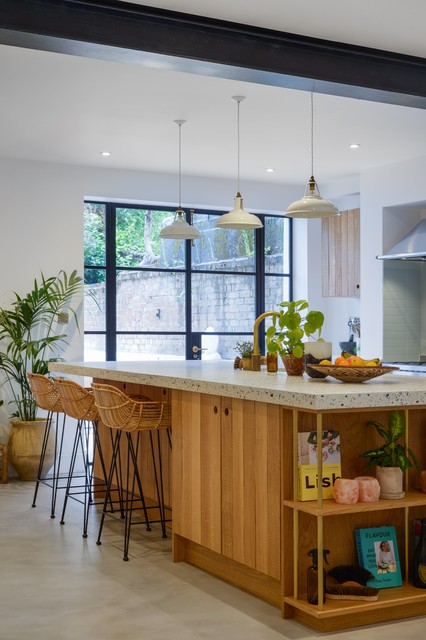 An Unusual Countertop Is At The Center Of This Bright Kitchen