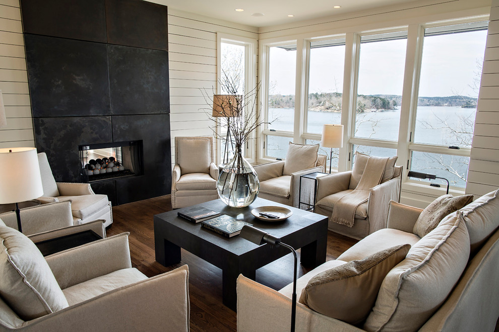 Inspiration for a mid-sized country open concept family room in Birmingham with white walls, dark hardwood floors, a standard fireplace, a tile fireplace surround, no tv and brown floor.