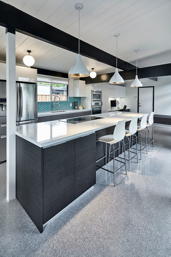 Design ideas for a large modern single-wall eat-in kitchen in San Francisco with a single-bowl sink, flat-panel cabinets, grey cabinets, quartz benchtops, blue splashback, ceramic splashback, stainless steel appliances, linoleum floors, with island and grey floor.