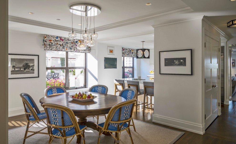 Inspiration for a mid-sized transitional medium tone wood floor kitchen/dining room combo remodel in Boston with white walls