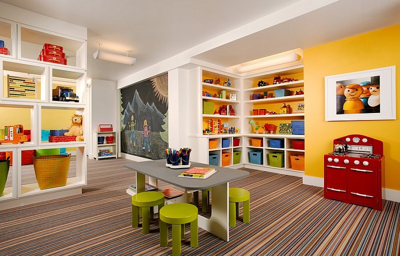 Inspiration for a large contemporary gender-neutral kids' playroom for kids 4-10 years old in Chicago with yellow walls, carpet and multi-coloured floor.