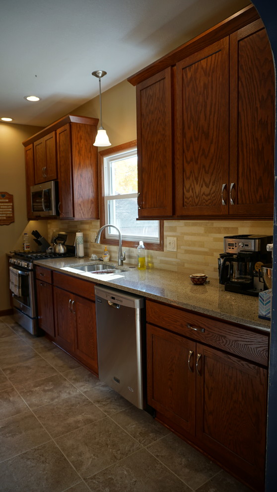 Photo of a mid-sized traditional kitchen in Other.