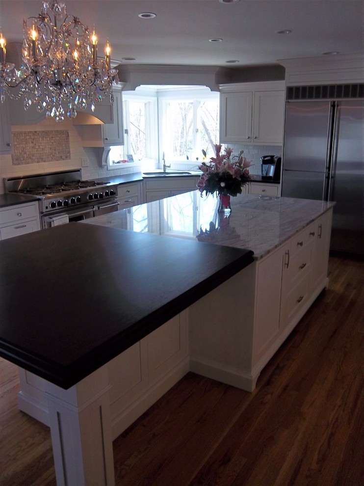 Example of a transitional kitchen design in New York