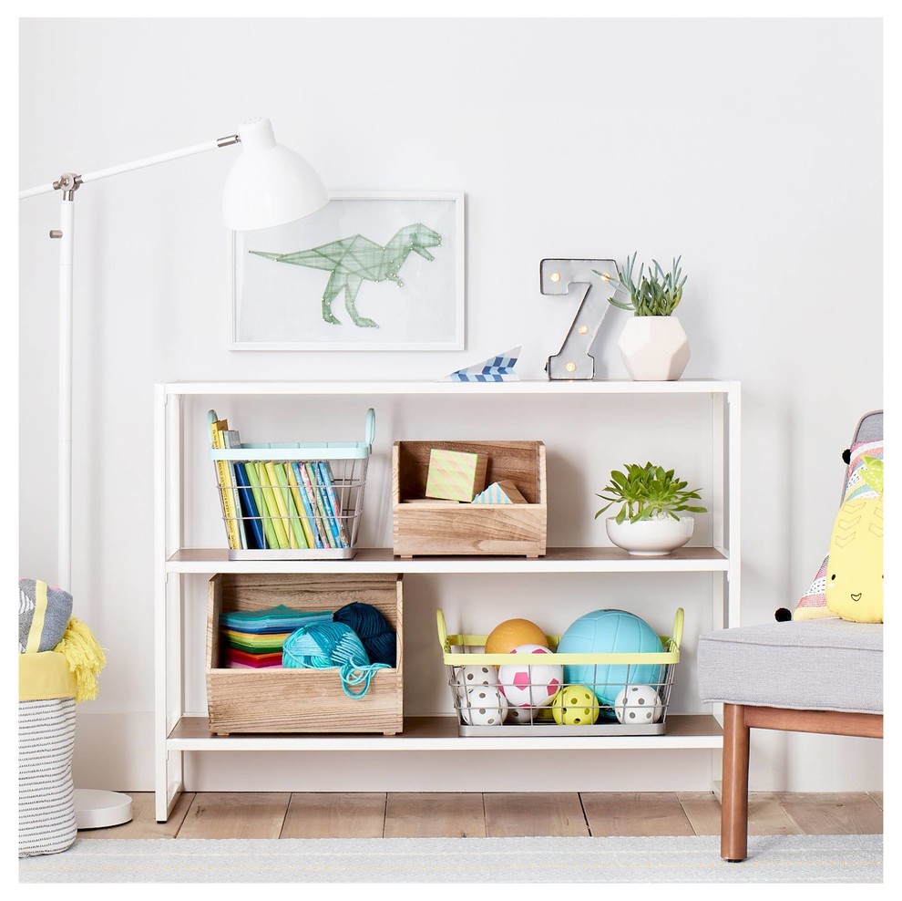 Inspiration for a mid-sized modern gender-neutral kids' playroom for kids 4-10 years old in Minneapolis with white walls and light hardwood floors.