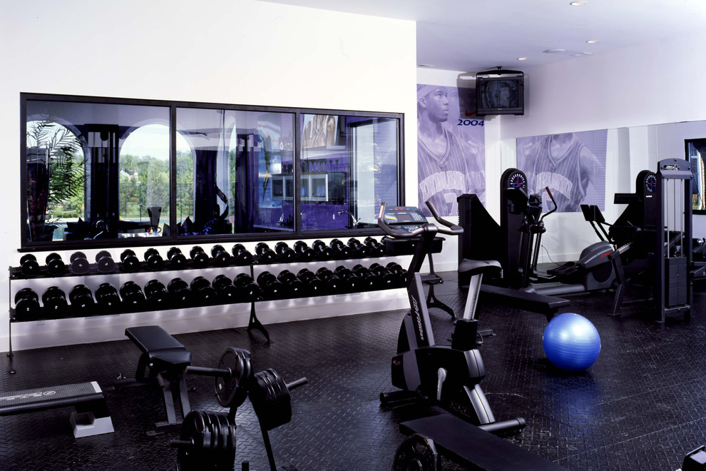 Inspiration for a mid-sized contemporary home weight room in Indianapolis with white walls.