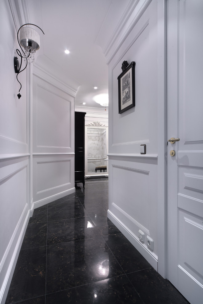 This is an example of a traditional hallway in Other with white walls.