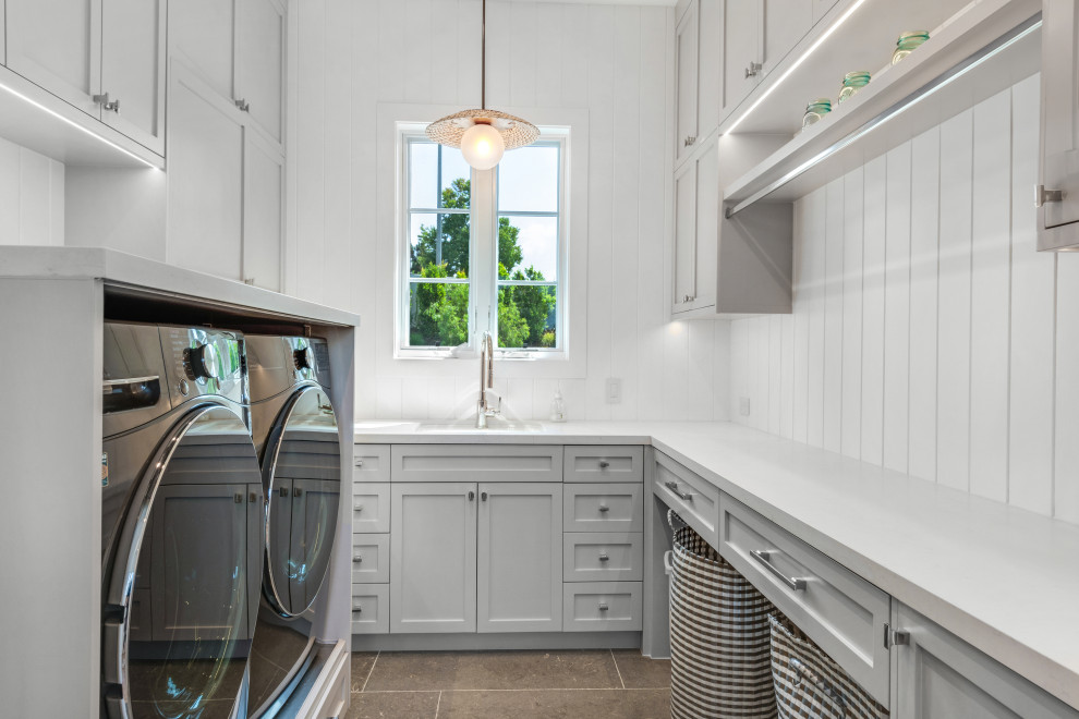 Example of a transitional laundry room design in Orange County
