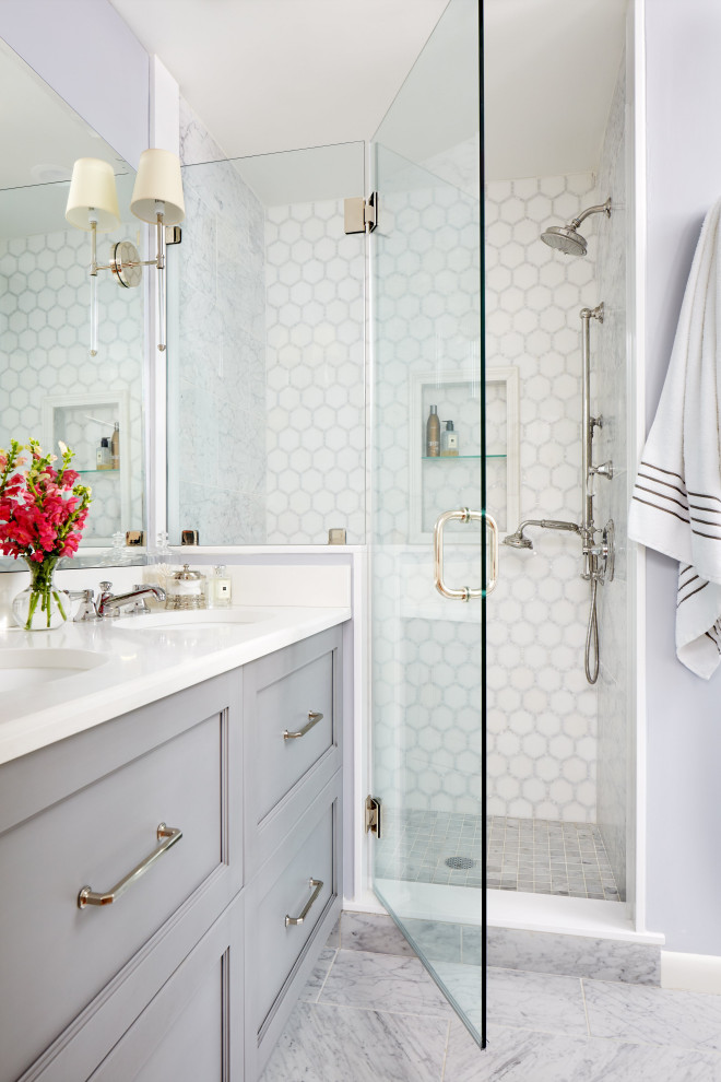 Inspiration for a mid-sized transitional master bathroom in DC Metro with recessed-panel cabinets, grey cabinets, an alcove shower, gray tile, mosaic tile, grey walls, marble floors, an undermount sink, quartzite benchtops, grey floor, a hinged shower door and white benchtops.