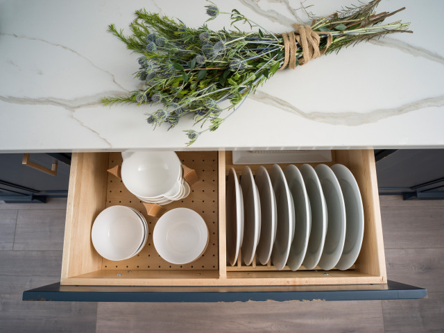 Blue White Kitchen Island With An Organized Dish Rack Drawer For