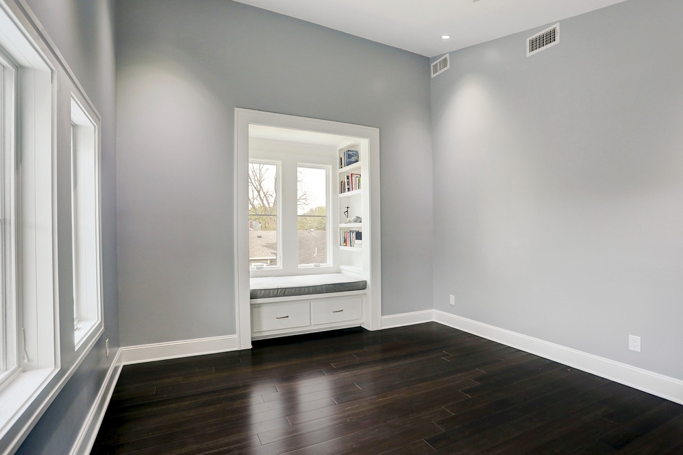 Mid-sized transitional master bedroom in Houston with grey walls, dark hardwood floors and brown floor.
