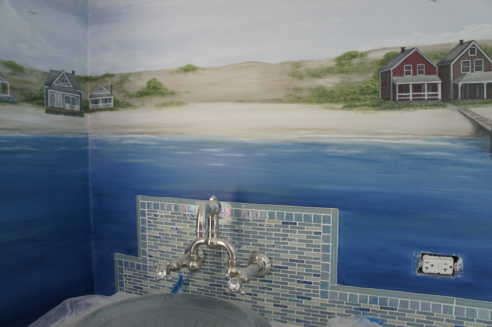 Example of a beach style home design design in Boston