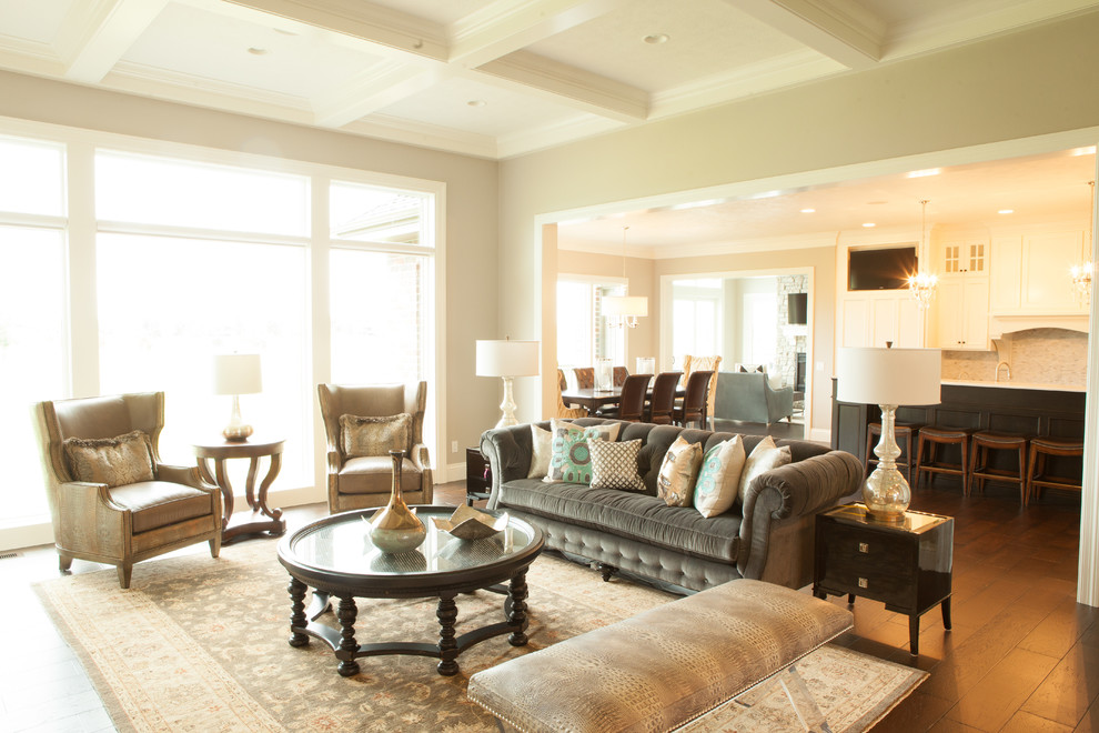 Example of a transitional open concept dark wood floor living room design with a wood fireplace surround