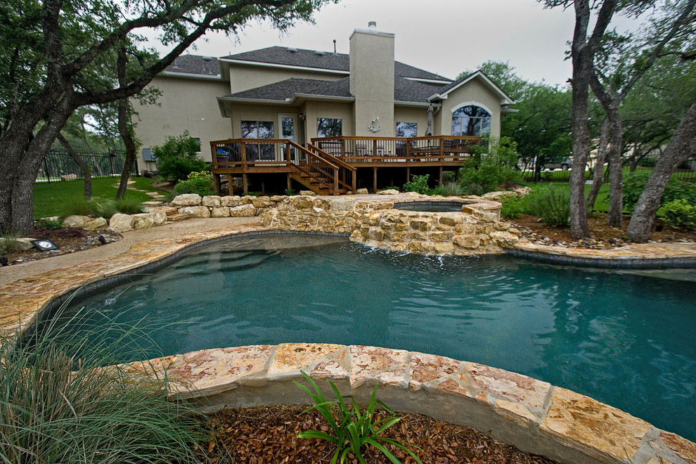 Mountain style home design photo in Austin