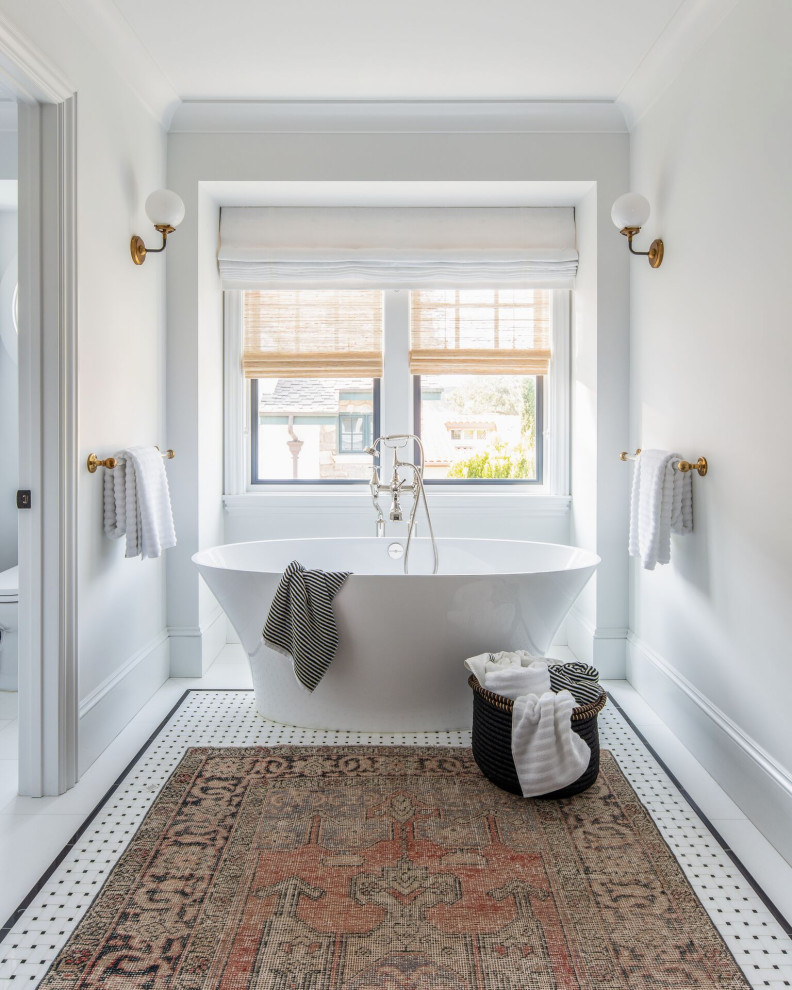 Design ideas for a transitional bathroom in San Francisco with a freestanding tub, white walls, mosaic tile floors and white floor.