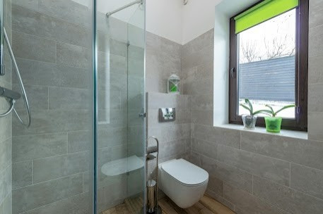 Transform Your Bathroom into a Serene Sanctuary with A & E Construction Design Build