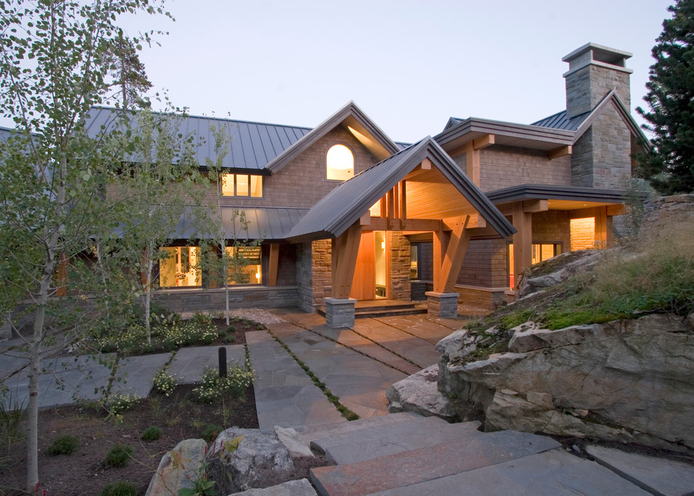 This is an example of a traditional exterior in Vancouver with stone veneer.