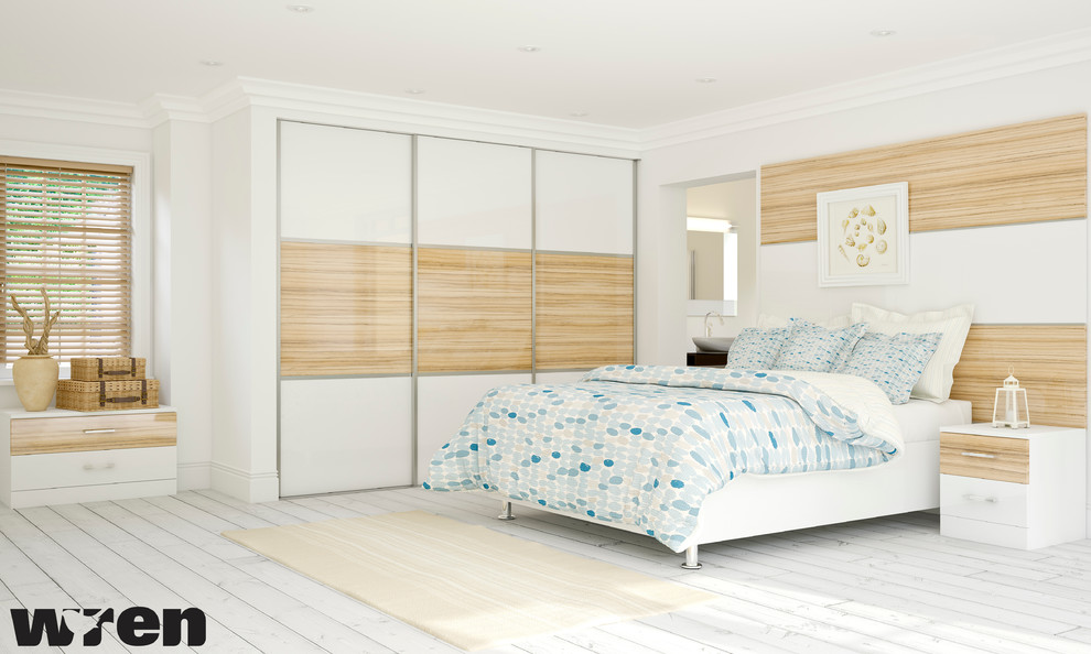 Example of an island style bedroom design in London