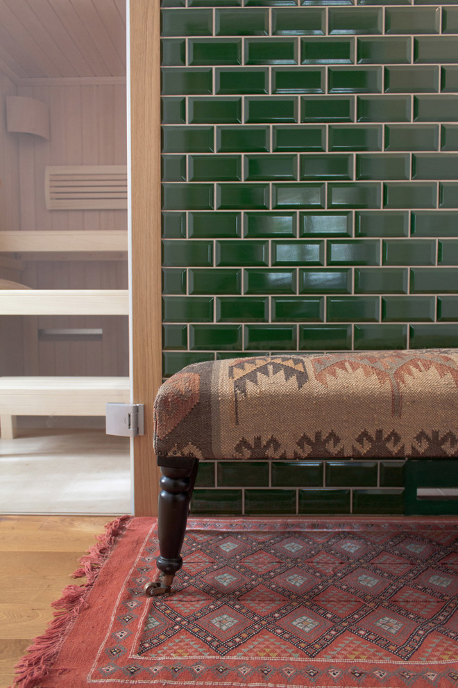 Small contemporary bathroom in Berlin with green tile and subway tile.