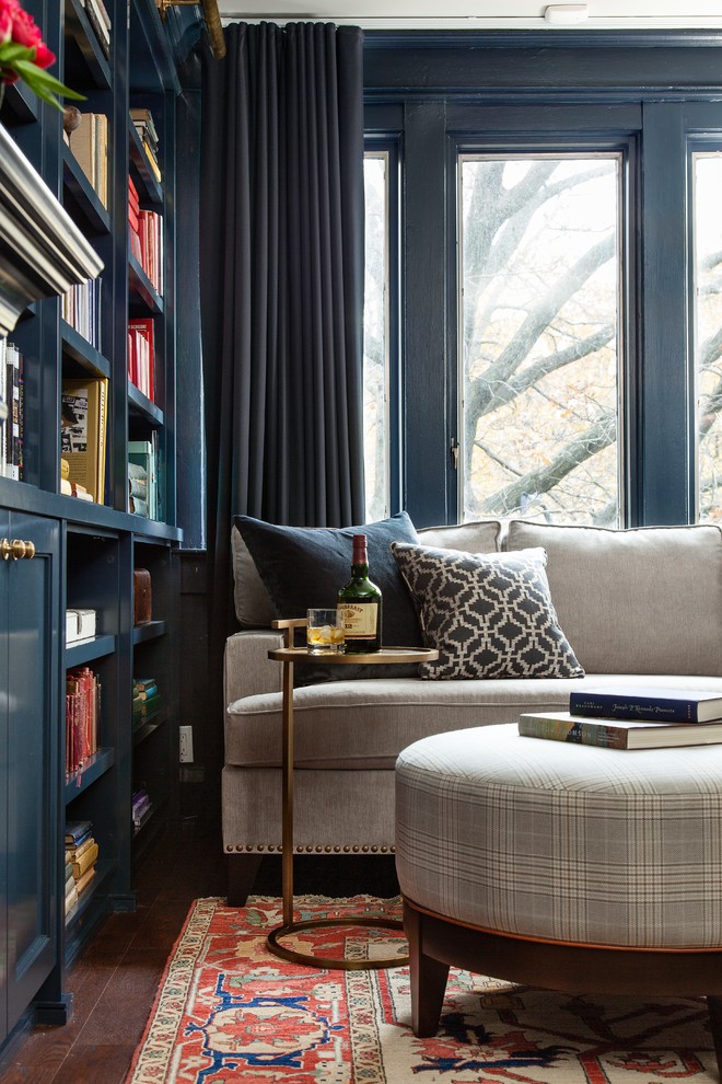 Example of a small classic enclosed dark wood floor living room design in Toronto with blue walls and a projector screen