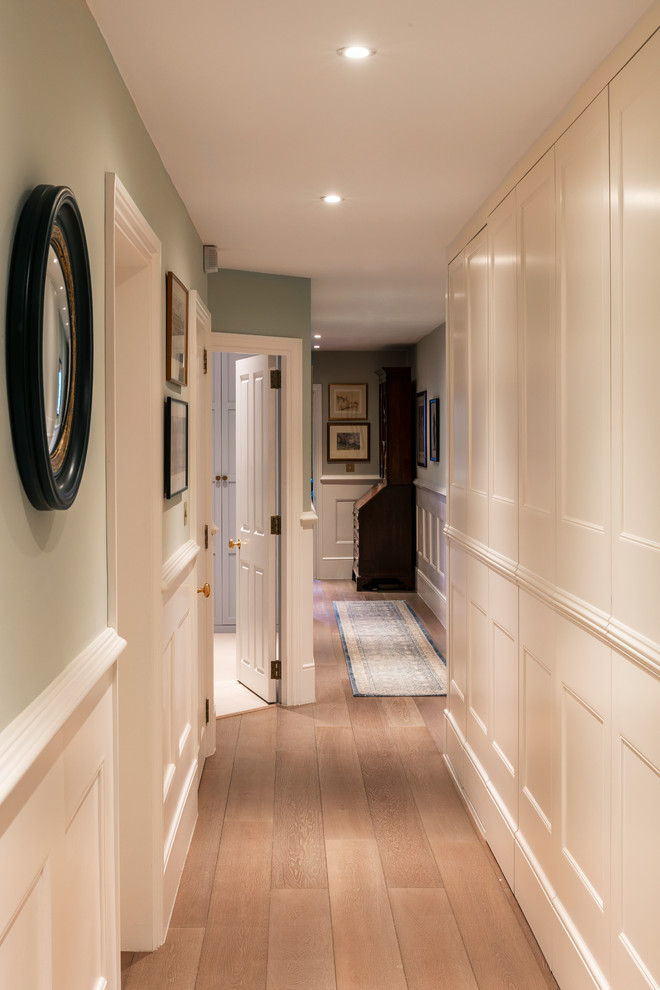 Photo of a mid-sized traditional hallway in London.