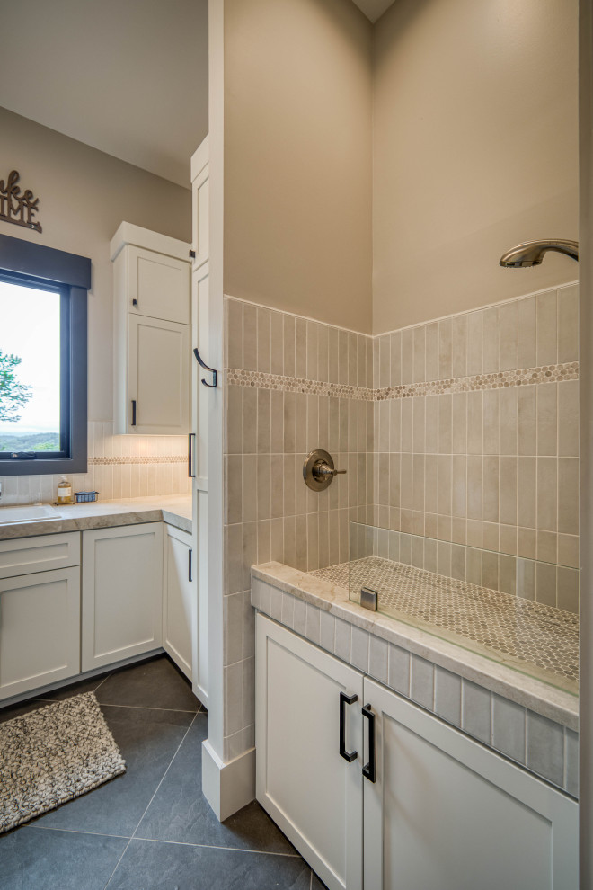 Example of a trendy laundry room design in Charlotte