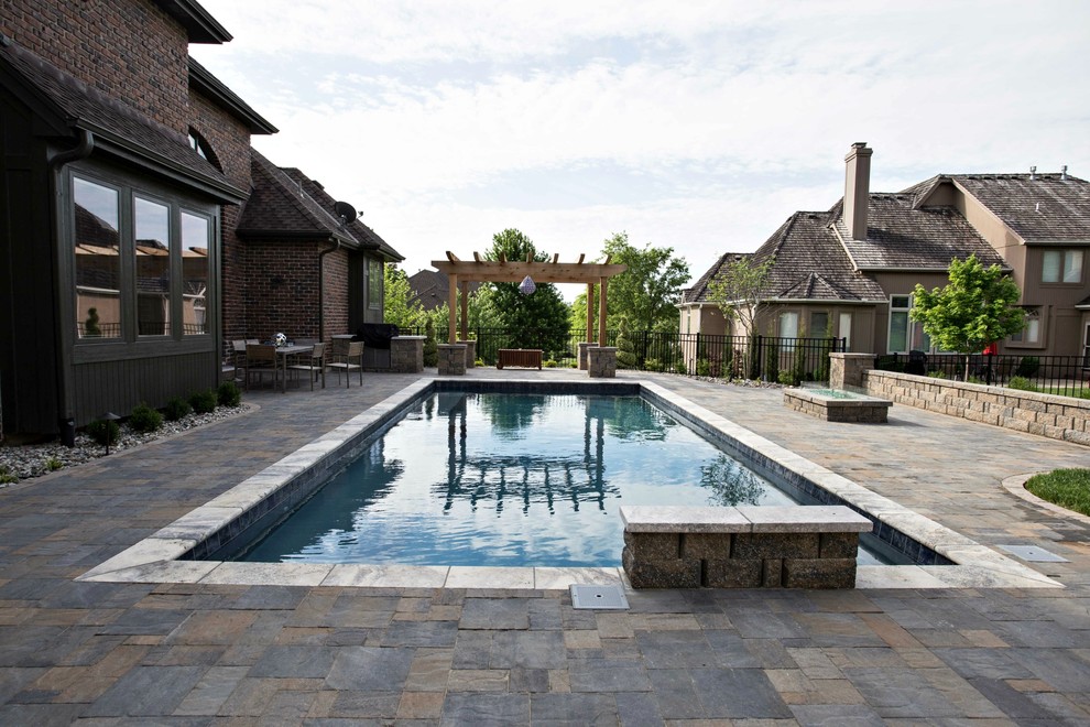 Design ideas for a large contemporary pool in Kansas City.