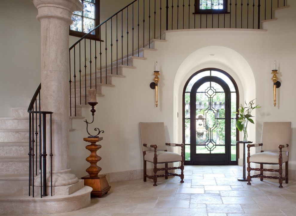 This is an example of a mediterranean curved staircase in Denver.