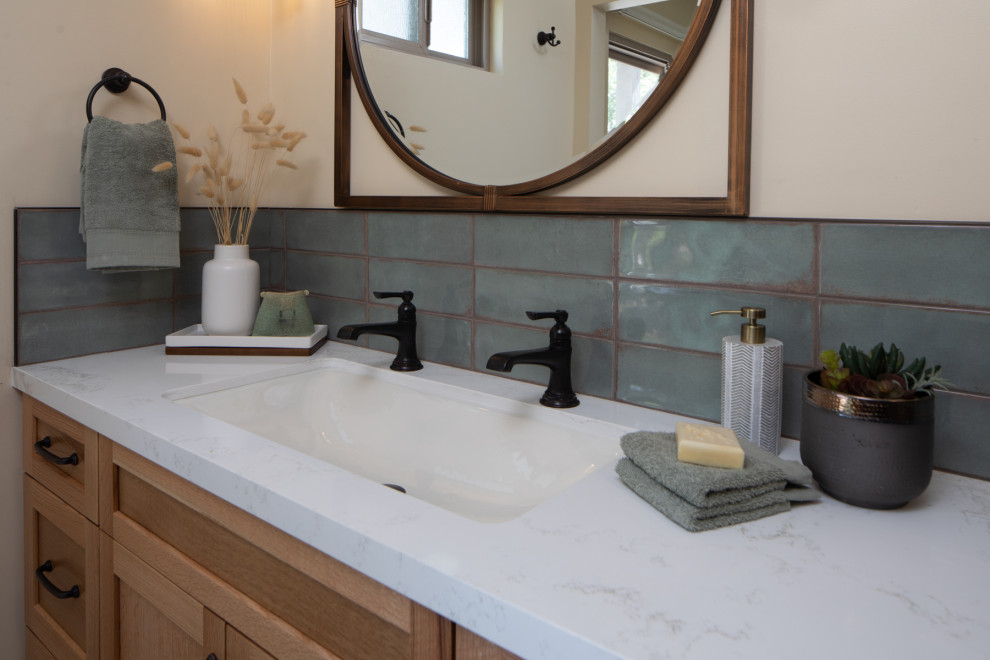 Inspiration for a mid-sized contemporary blue tile and porcelain tile travertine floor, multicolored floor and double-sink bathroom remodel in San Diego with shaker cabinets, light wood cabinets, a bidet, beige walls, an undermount sink, quartz countertops, white countertops and a built-in vanity