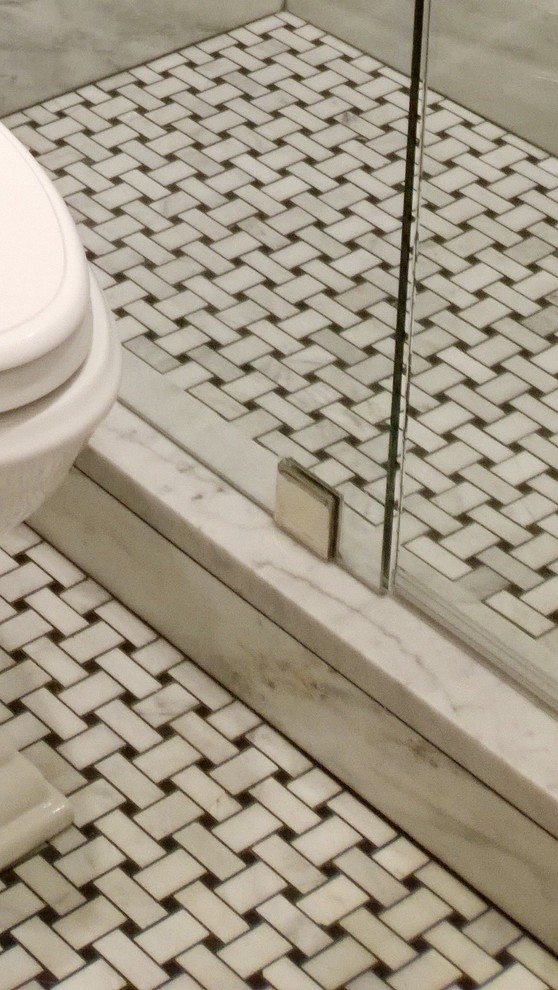 Example of a small classic 3/4 white tile and stone tile mosaic tile floor alcove shower design in Chicago with an undermount sink, recessed-panel cabinets, black cabinets, quartzite countertops, a two-piece toilet and gray walls