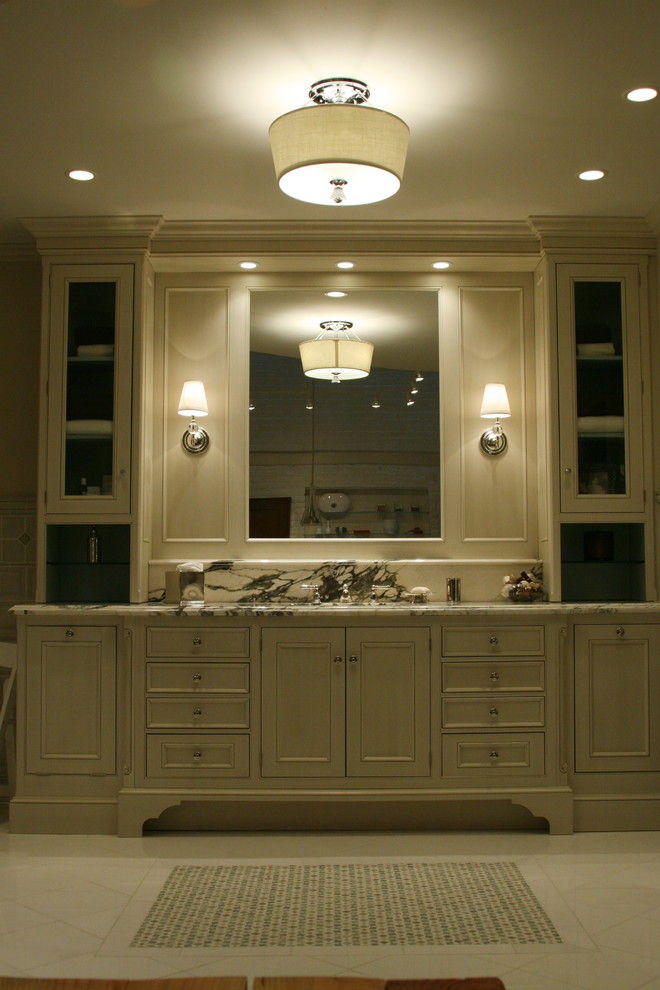 Large transitional master gray tile bathroom photo in Chicago with recessed-panel cabinets, distressed cabinets and marble countertops