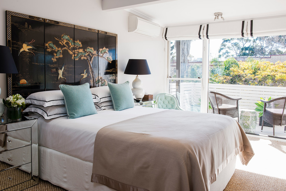 Inspiration for a transitional bedroom in Sydney with white walls.