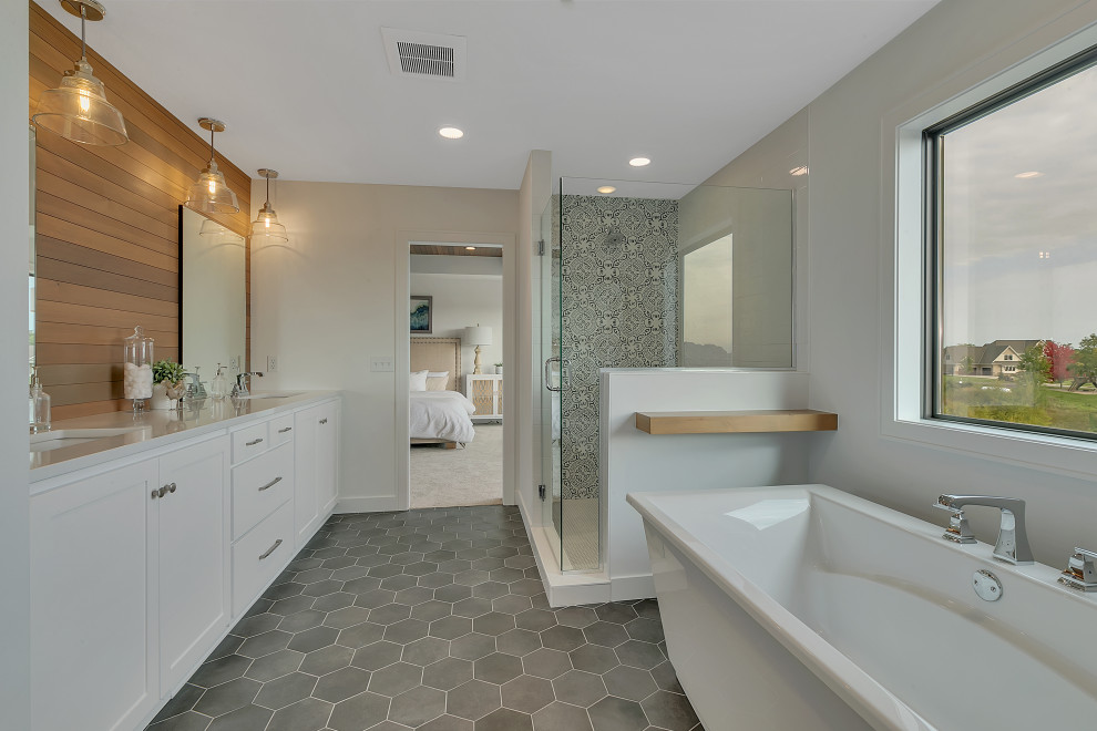 Inspiration for a large country master bathroom in Minneapolis with white cabinets, a freestanding tub, a corner shower, white tile, an undermount sink, wood benchtops, grey floor, a hinged shower door, white benchtops, an enclosed toilet, a single vanity and a built-in vanity.
