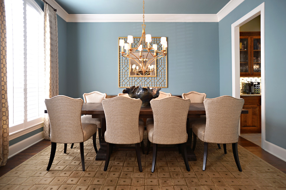 Expansive traditional separate dining room in Dallas with blue walls, dark hardwood floors and no fireplace.