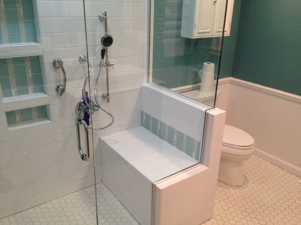 Large transitional master bathroom in Cleveland with an integrated sink, marble benchtops, an open shower, a two-piece toilet, white tile, porcelain tile, multi-coloured walls and porcelain floors.