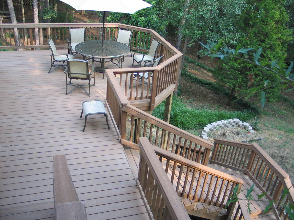 This is an example of a large eclectic backyard deck in Atlanta.