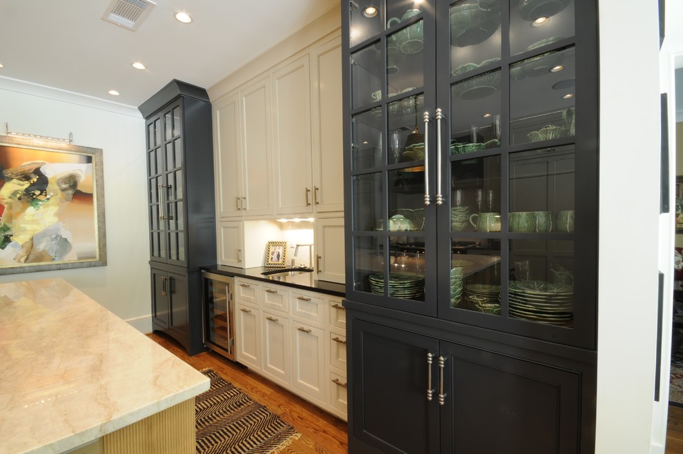 Inspiration for a large transitional u-shaped dark wood floor and brown floor open concept kitchen remodel in Birmingham with an undermount sink, shaker cabinets, white cabinets, granite countertops, white backsplash, mosaic tile backsplash, paneled appliances and an island