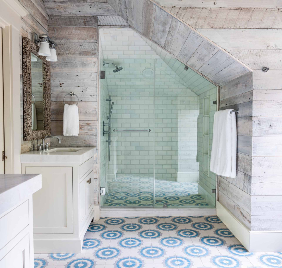 Bathroom - country multicolored floor, double-sink and wood wall bathroom idea in Other with white cabinets, white walls, an undermount sink, marble countertops, a hinged shower door, white countertops, a built-in vanity and shaker cabinets