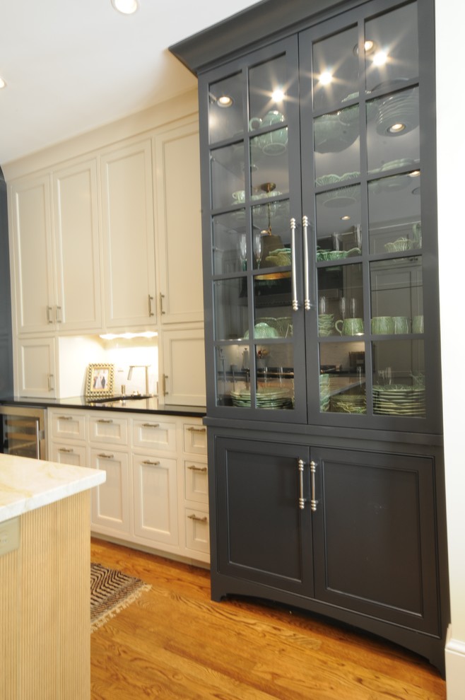 Example of a large transitional u-shaped dark wood floor and brown floor open concept kitchen design in Birmingham with an undermount sink, shaker cabinets, white cabinets, granite countertops, white backsplash, mosaic tile backsplash, paneled appliances and an island